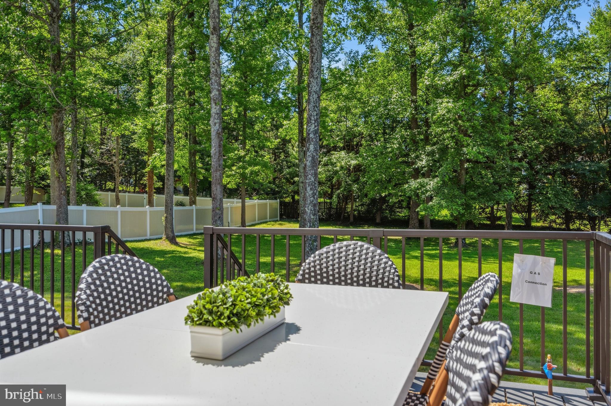 6733 Catskill Road Lorton, VA 22079 - Photo 59 of 62 Close up of Deck with table & chairs