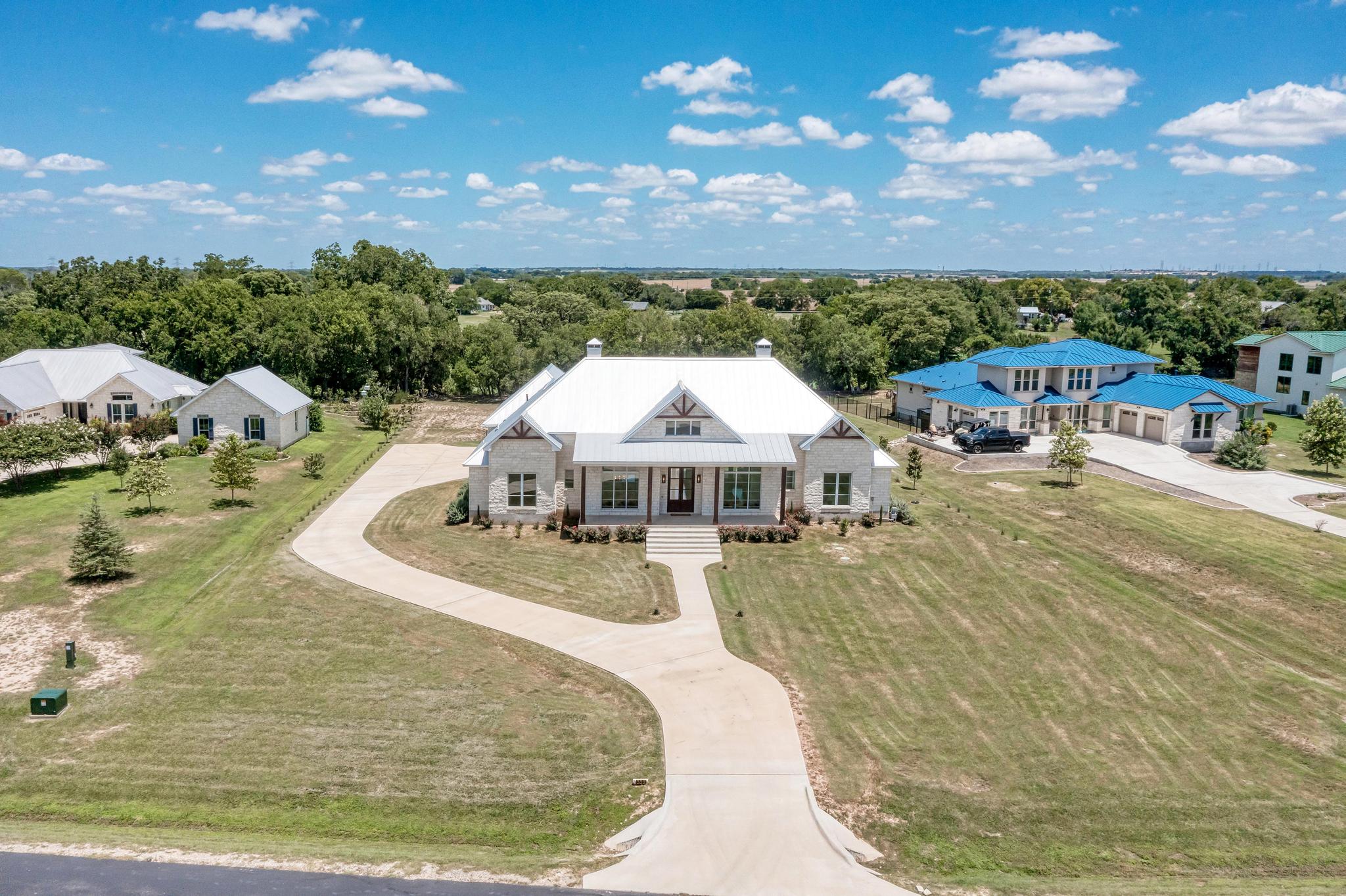 332 River Ranch Circle Martindale, TX 78655 - Photo 1 of 1 a view of a swimming pool with an outdoor space
