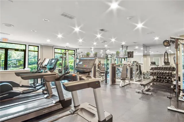 a backyard of a house with yard barbeque oven and outdoor seating