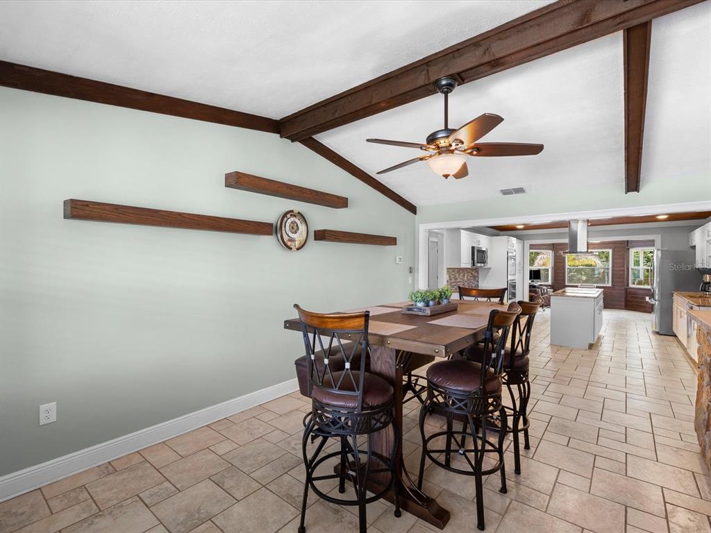 5904 Springrun Court Holiday, FL 34690 - Photo 17 of 53 a view of a dining room with furniture