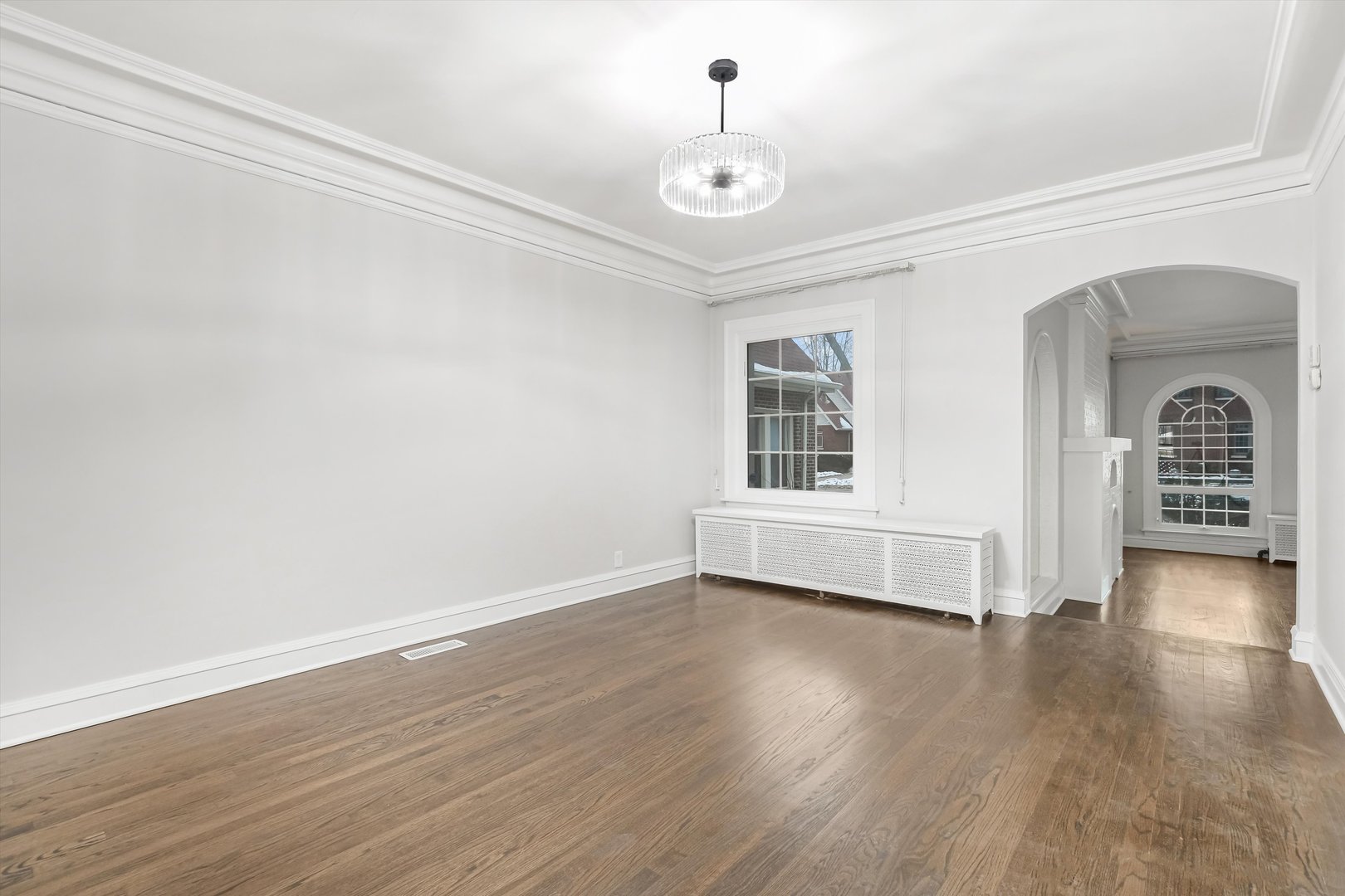 11340 South Union Avenue Chicago, IL 60628 - Photo 4 of 27 wooden floor in an empty room with a window