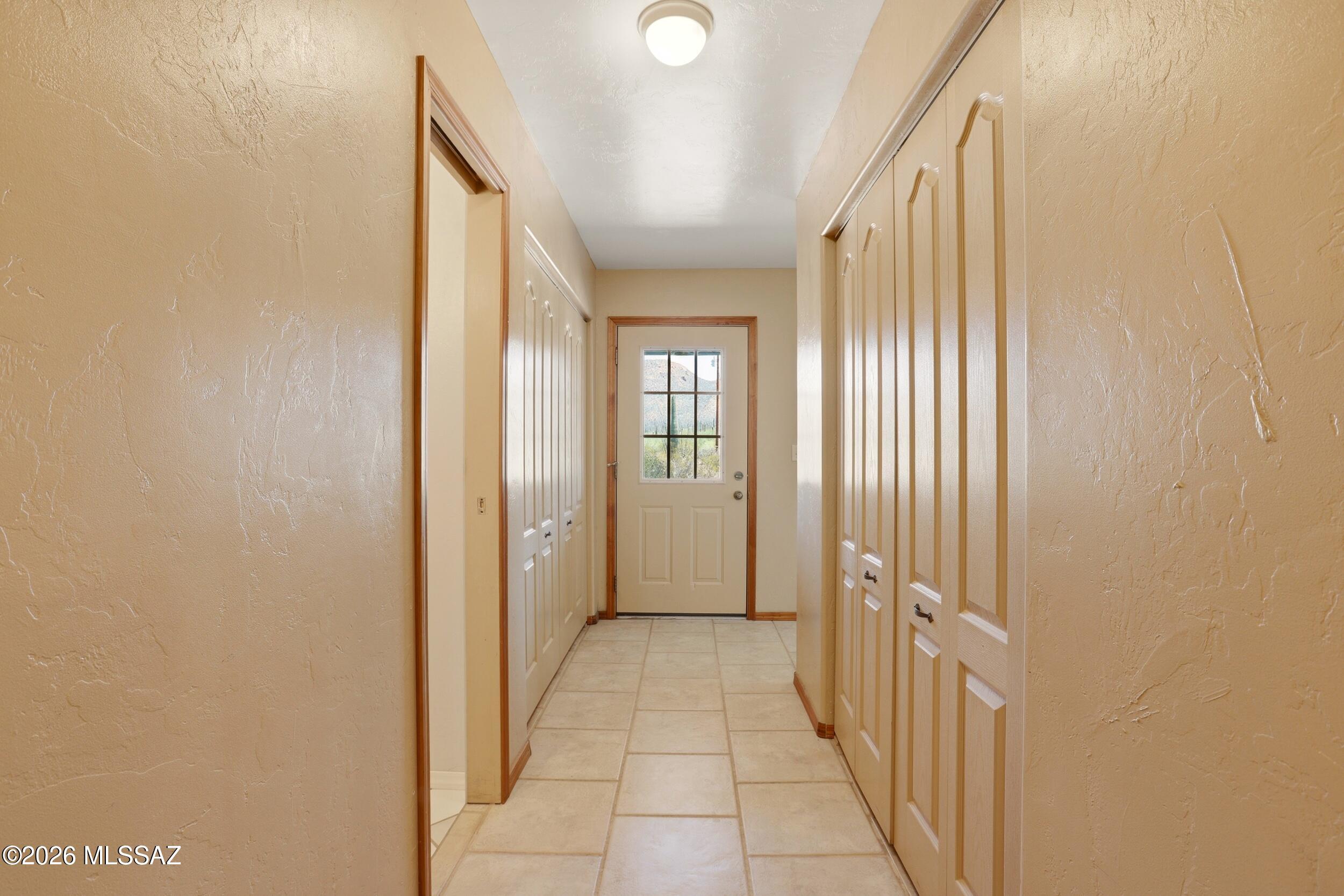 10855 West Mile Wide Road Tucson, AZ 85743 - Photo 36 of 47 Rear Exit Hallway