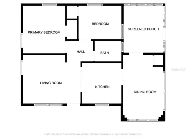 a picture of a wall with a white building