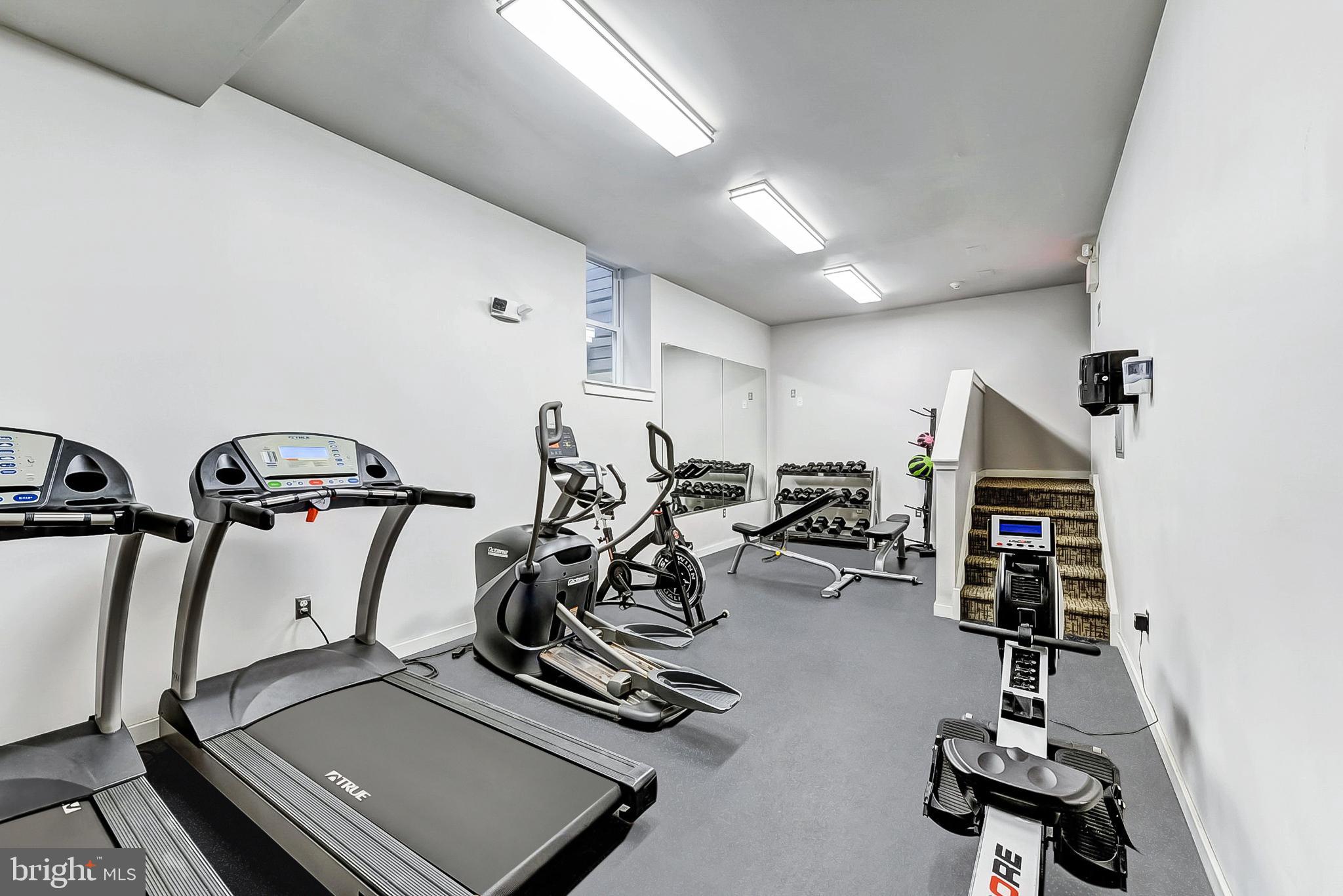 4605 Chester Avenue, Unit STUDIO Philadelphia, PA 19143 - Photo 11 of 12 a view of a room with gym equipment
