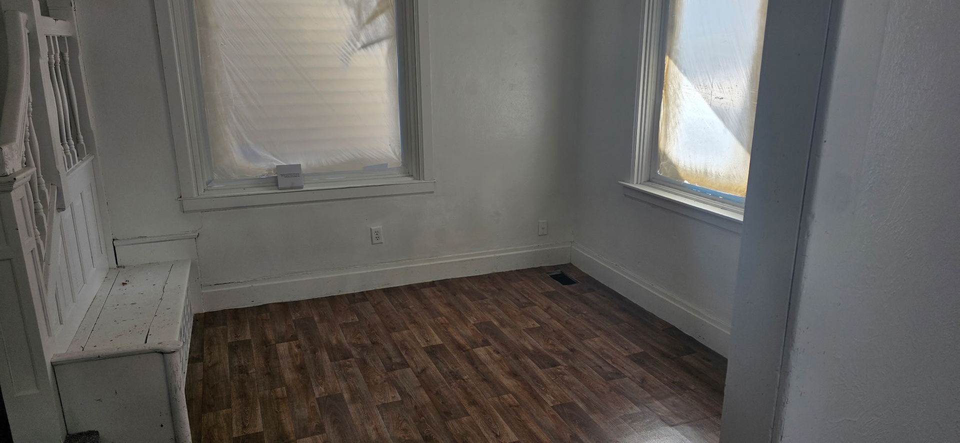 506 Spring Street Peoria, IL 61603 - Photo 4 of 9 a small space with wooden floor and a window