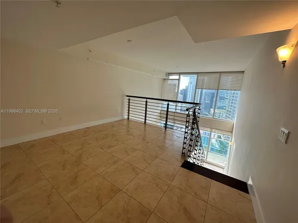 an empty room with windows