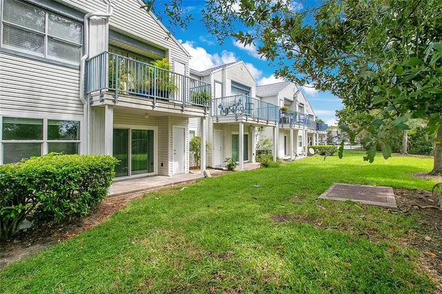 a view of yard in front of house with yard