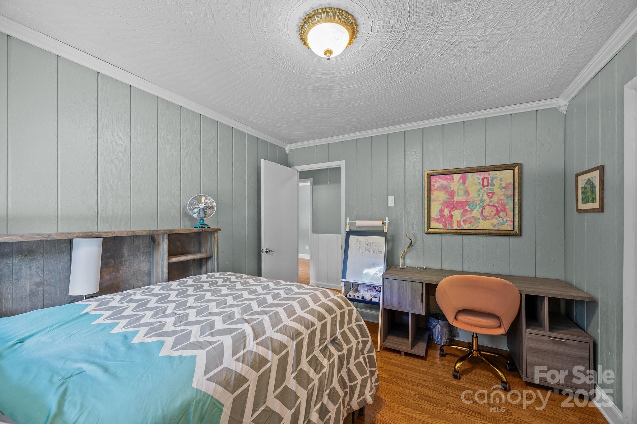 64 Christopher Lane Sylva, NC 28779 - Photo 18 of 31 a bedroom with a bed and chair