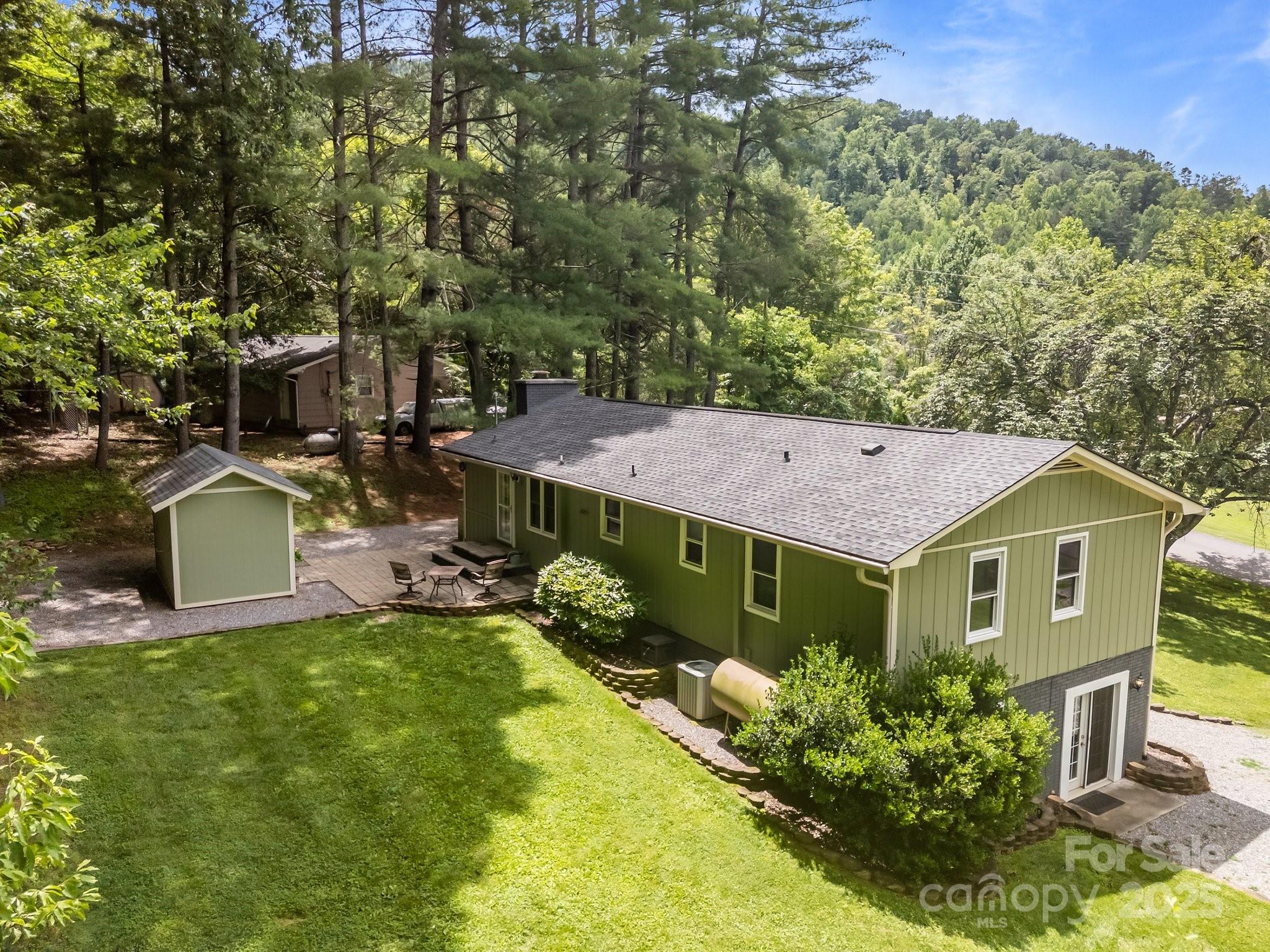 64 Christopher Lane Sylva, NC 28779 - Photo 7 of 31 a front view of a house with garden