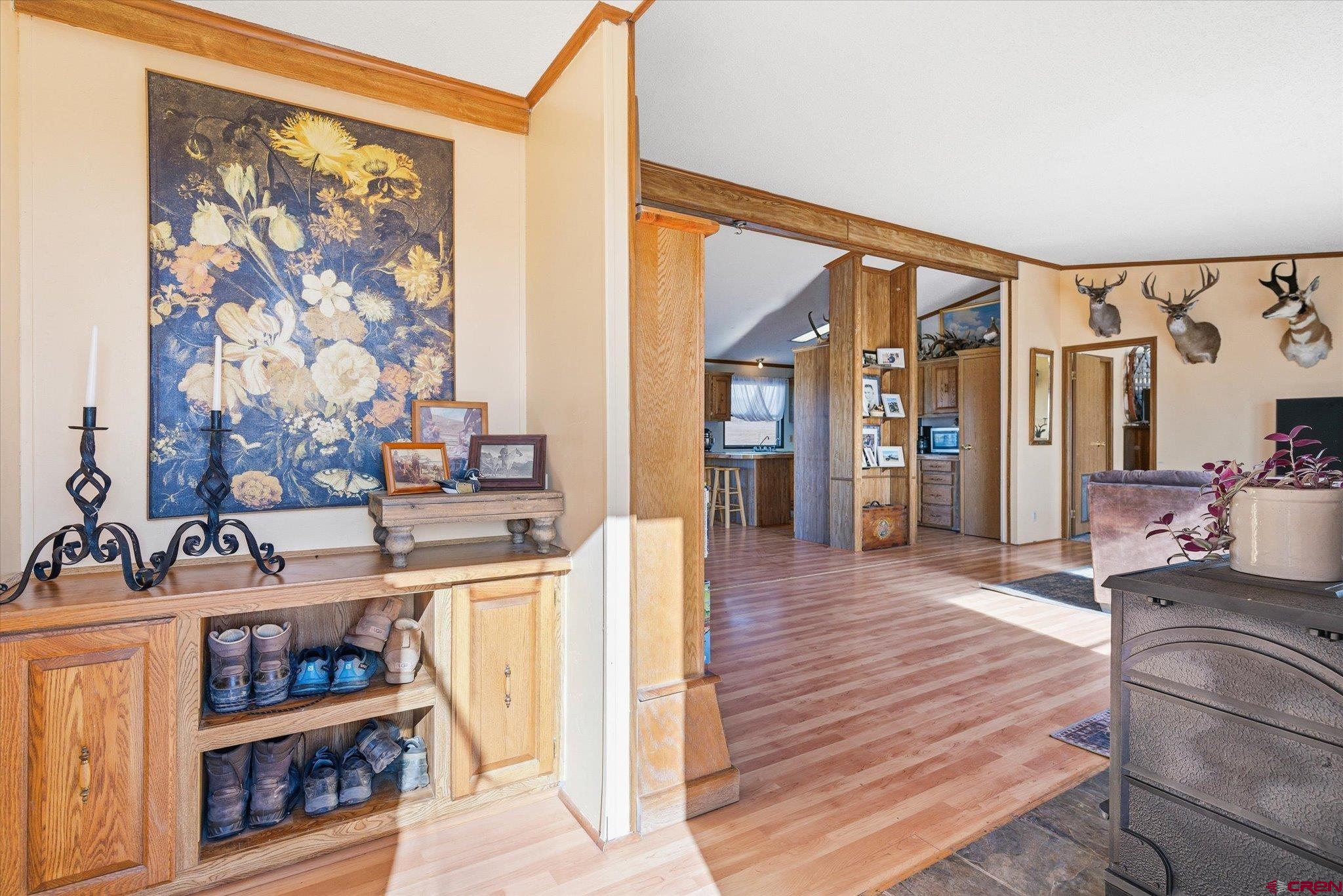 1966 County Road 321 Ignacio, CO 81137 - Photo 3 of 26 a living room with stainless steel appliances furniture a rug and a large window
