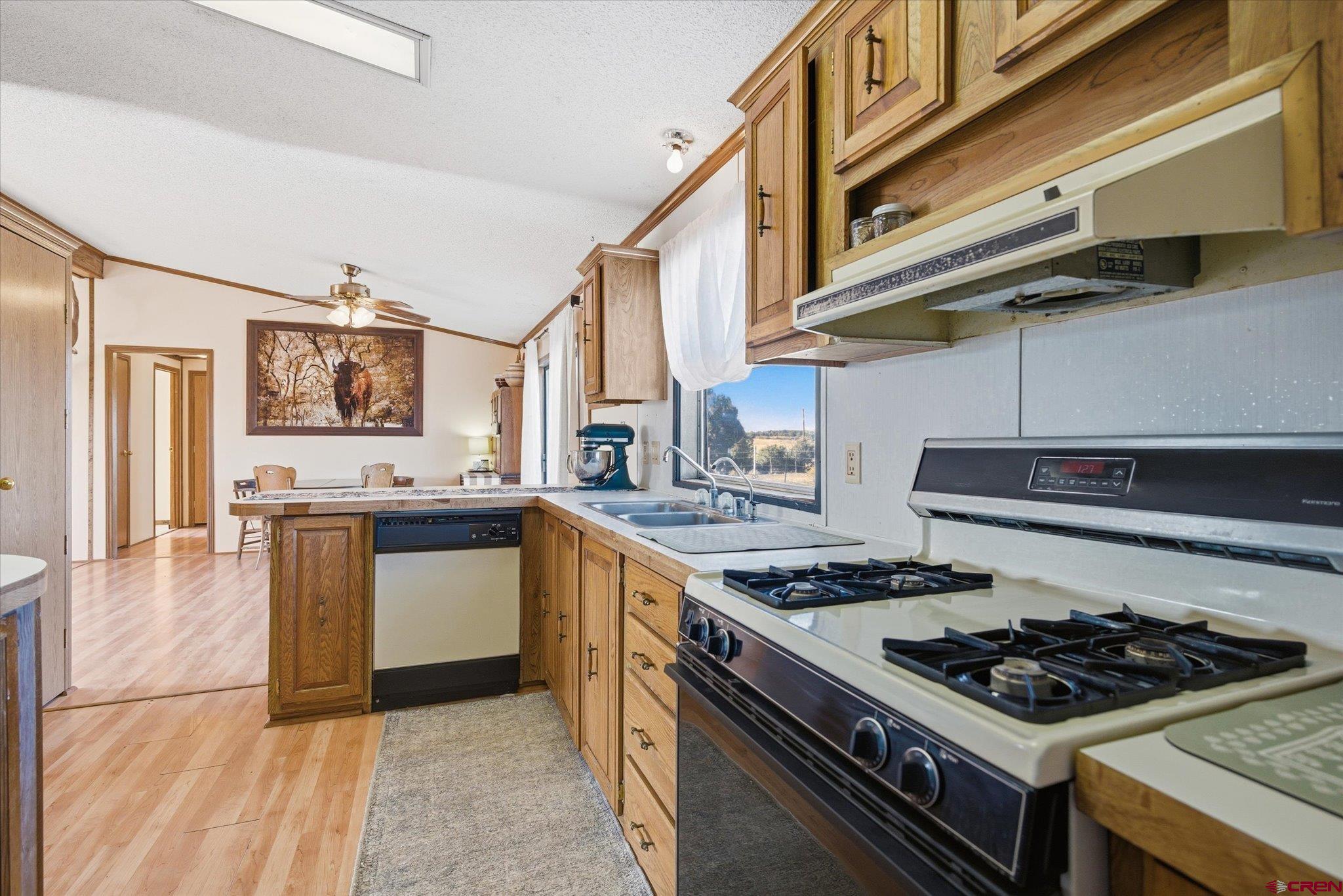 1966 County Road 321 Ignacio, CO 81137 - Photo 8 of 26 a kitchen with a stove and a sink