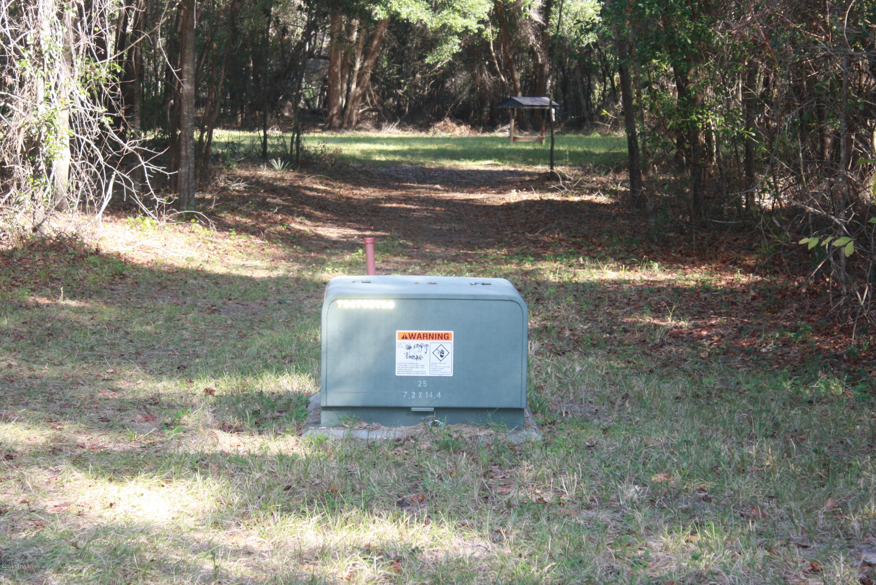 301 Georgetown Shortcut Road Crescent City, FL 32112 - Photo 32 of 108 a view of outdoor space with trees all around