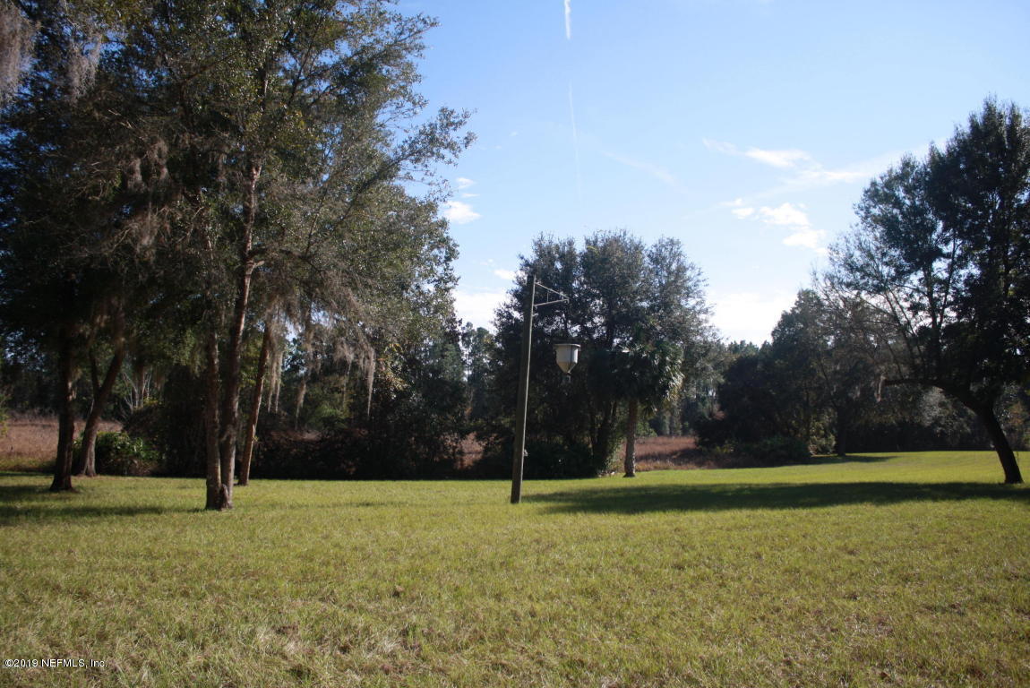 301 Georgetown Shortcut Road Crescent City, FL 32112 - Photo 87 of 108 a view of a field with trees