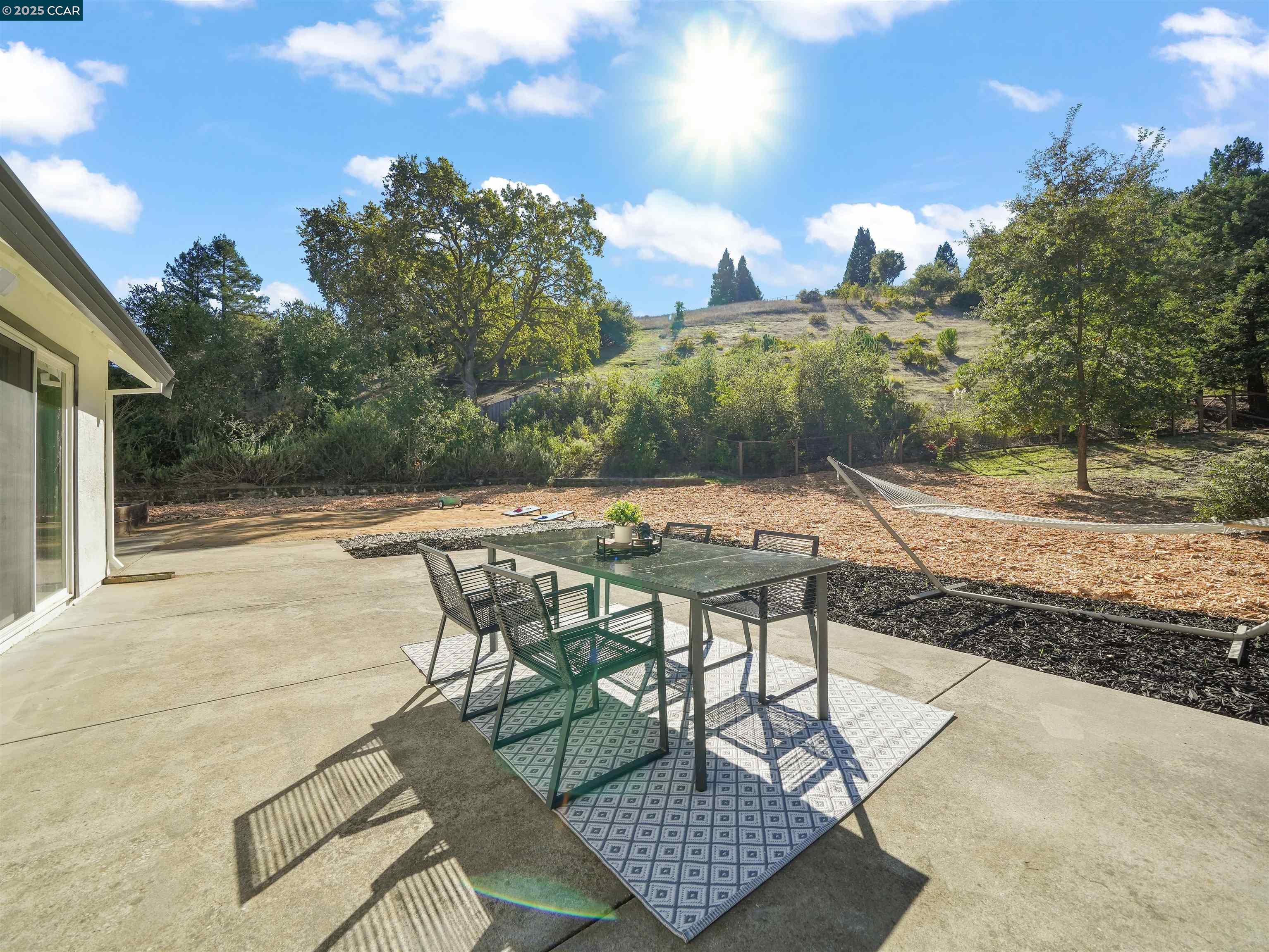 2482 Wildhorse Drive San Ramon, CA 94583 - Photo 33 of 41 a view of a patio with a table and chairs