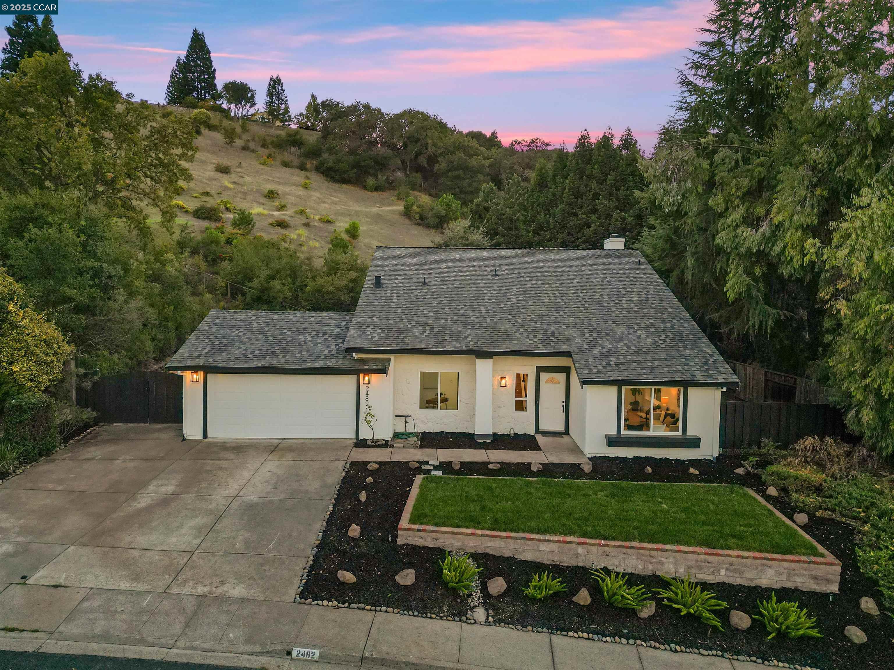 2482 Wildhorse Drive San Ramon, CA 94583 - Photo 4 of 41 a front view of a house with a yard