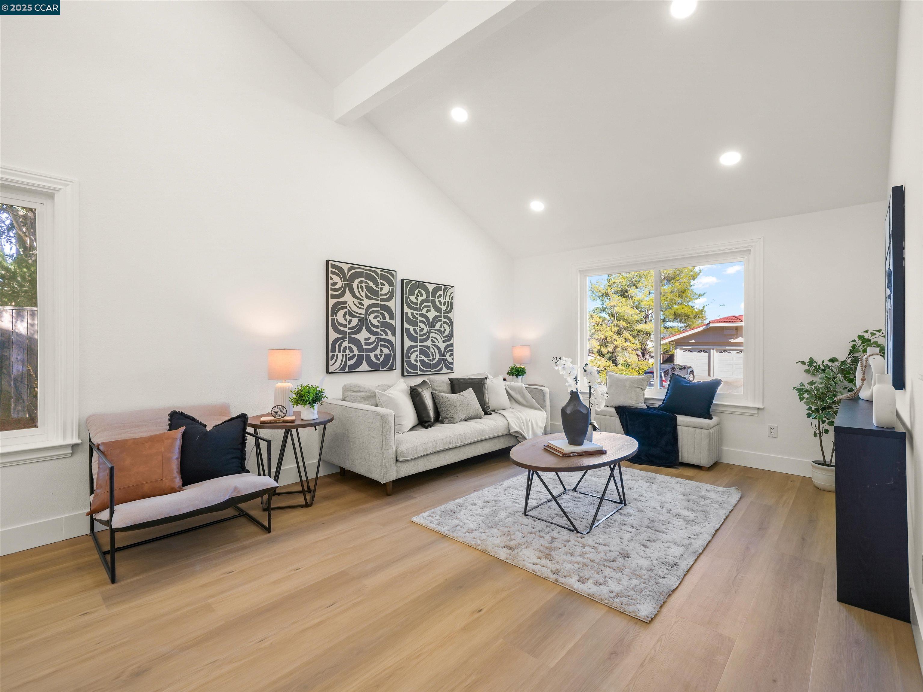 2482 Wildhorse Drive San Ramon, CA 94583 - Photo 5 of 41 a living room with furniture and a potted plant