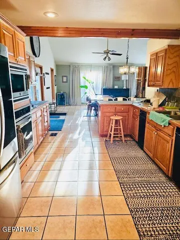 a lobby with furniture and a rug
