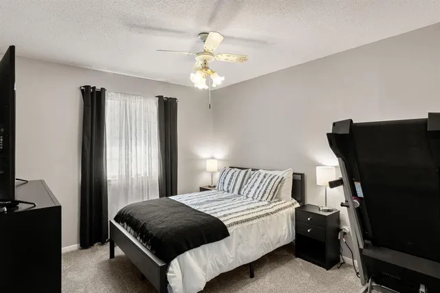 a view of a hallway with a kitchen