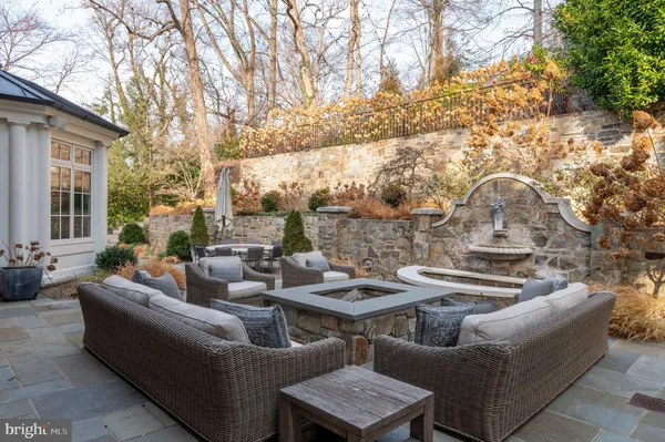 a outdoor living space with furniture and garden view