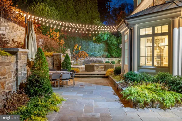 a garden view with a seating space