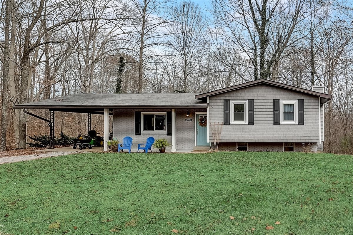 2087 River Road Clarksville, TN 37040 - Photo 2 of 33 a view of a house with a yard and sitting area
