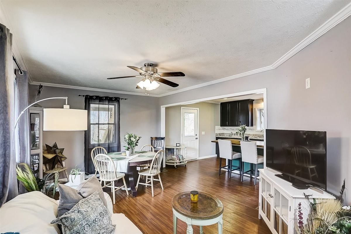 2087 River Road Clarksville, TN 37040 - Photo 11 of 33 a living room with furniture and a flat screen tv