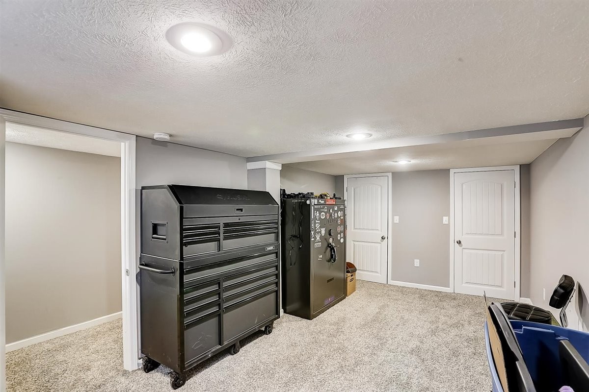 2087 River Road Clarksville, TN 37040 - Photo 23 of 33 a view of walk in closet with clothes