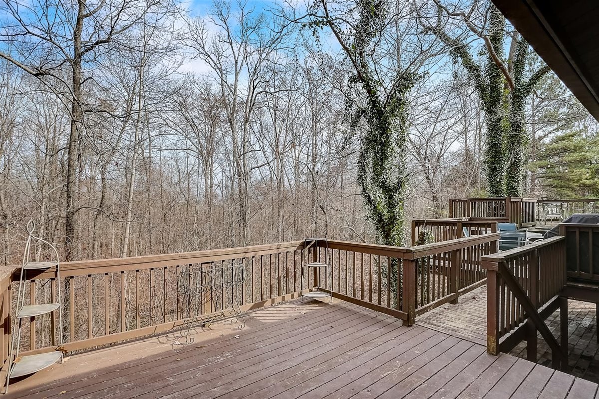 2087 River Road Clarksville, TN 37040 - Photo 25 of 33 a view of a balcony with wooden floor and fence