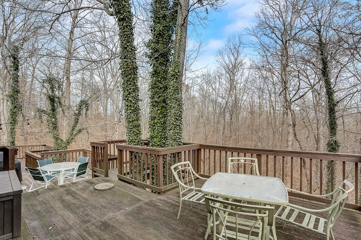 2087 River Road Clarksville, TN 37040 - Photo 27 of 33 a view of a chairs and table on the deck