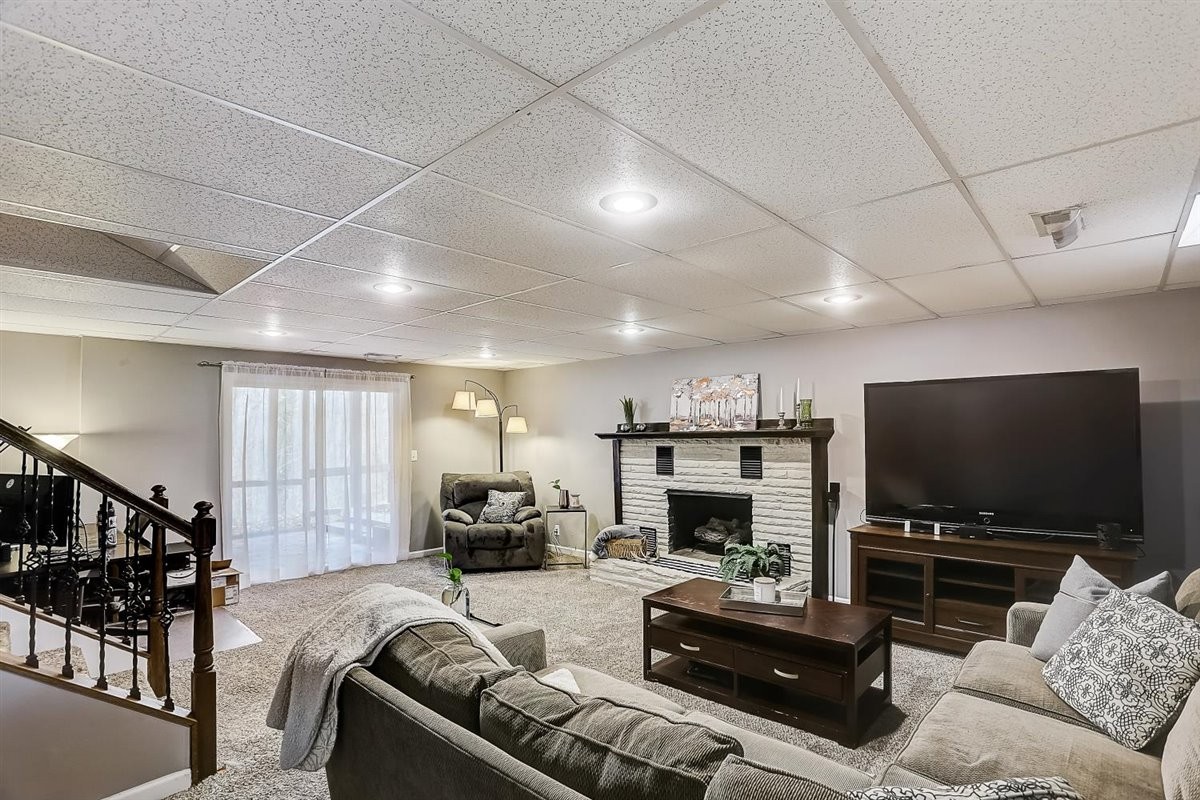 2087 River Road Clarksville, TN 37040 - Photo 5 of 33 a living room with furniture and a flat screen tv