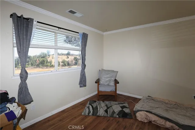 a room with furniture and a window