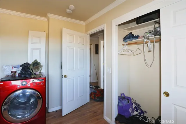 a view of bathroom with washer and dryer