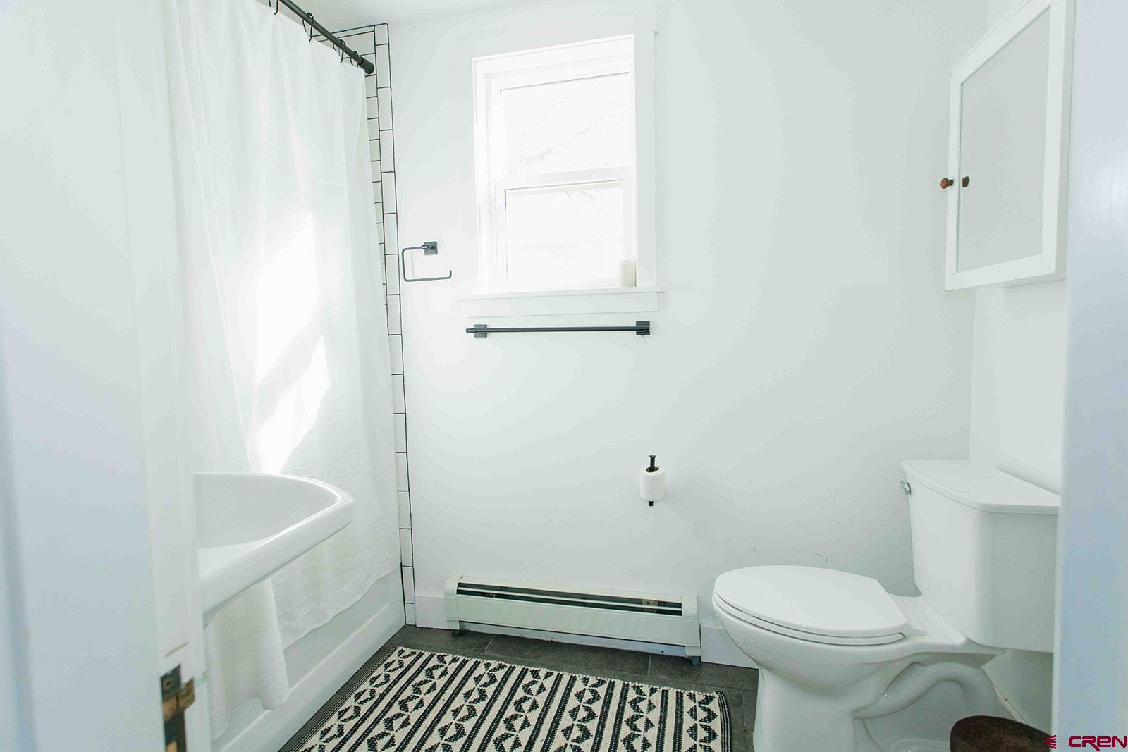 62966 Ohlm Road Montrose, CO 81403 - Photo 27 of 43 a bathroom with a sink toilet and shower