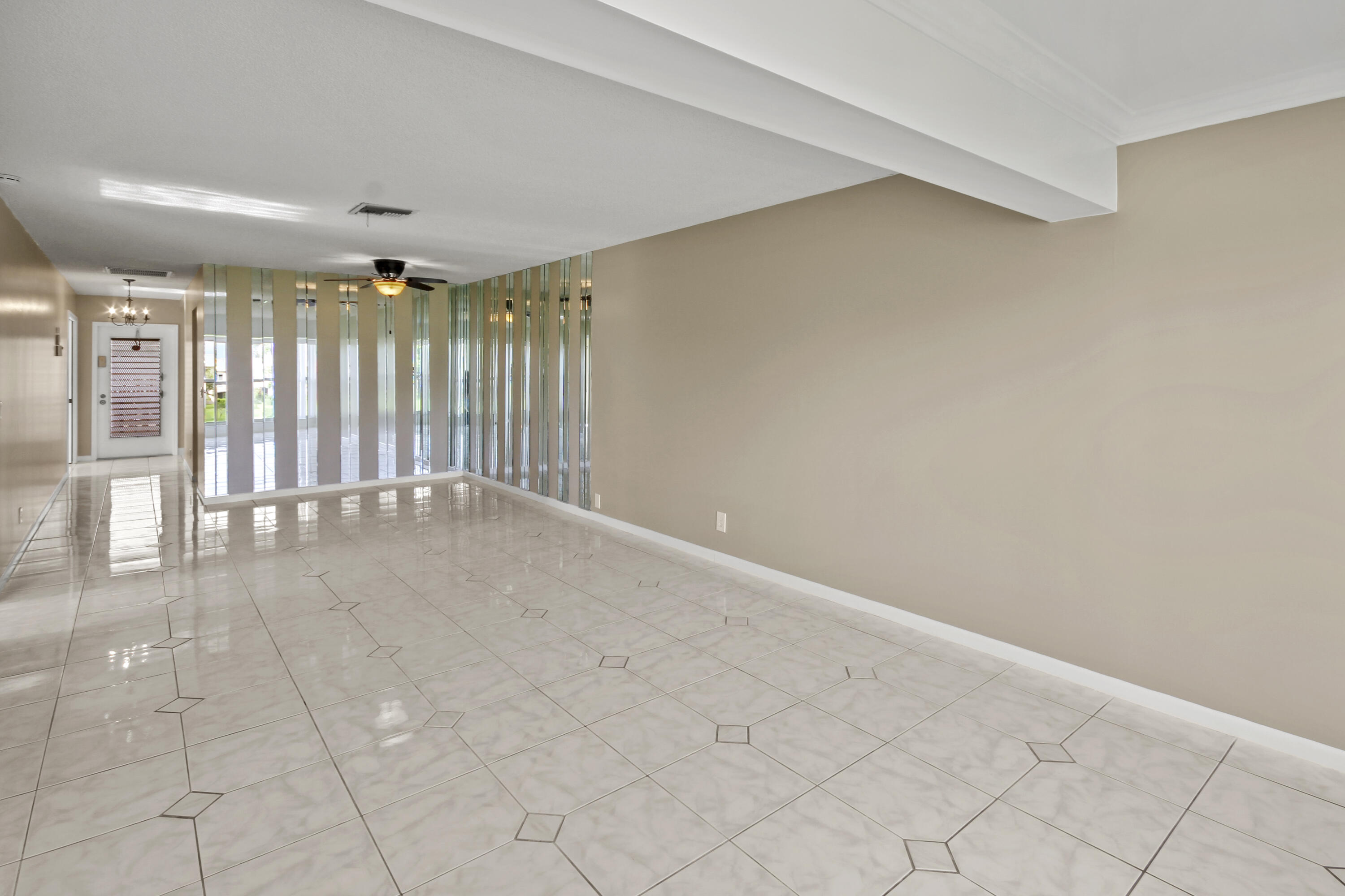 1421 Northwest 20th Avenue, Unit 204 Delray Beach, FL 33445 - Photo 12 of 22 a view of an empty room