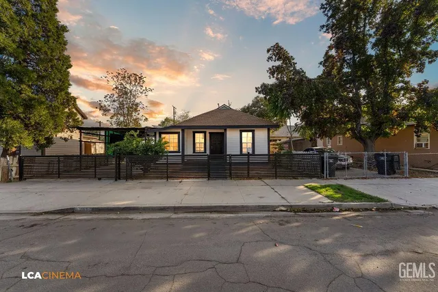 a view of house with outdoor space and street view