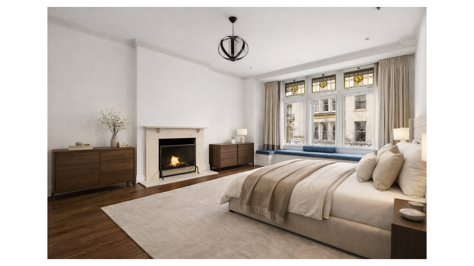 18 East 62nd Street Manhattan, NY 10065 - Photo 12 of 19 a bedroom with a bed and a fireplace