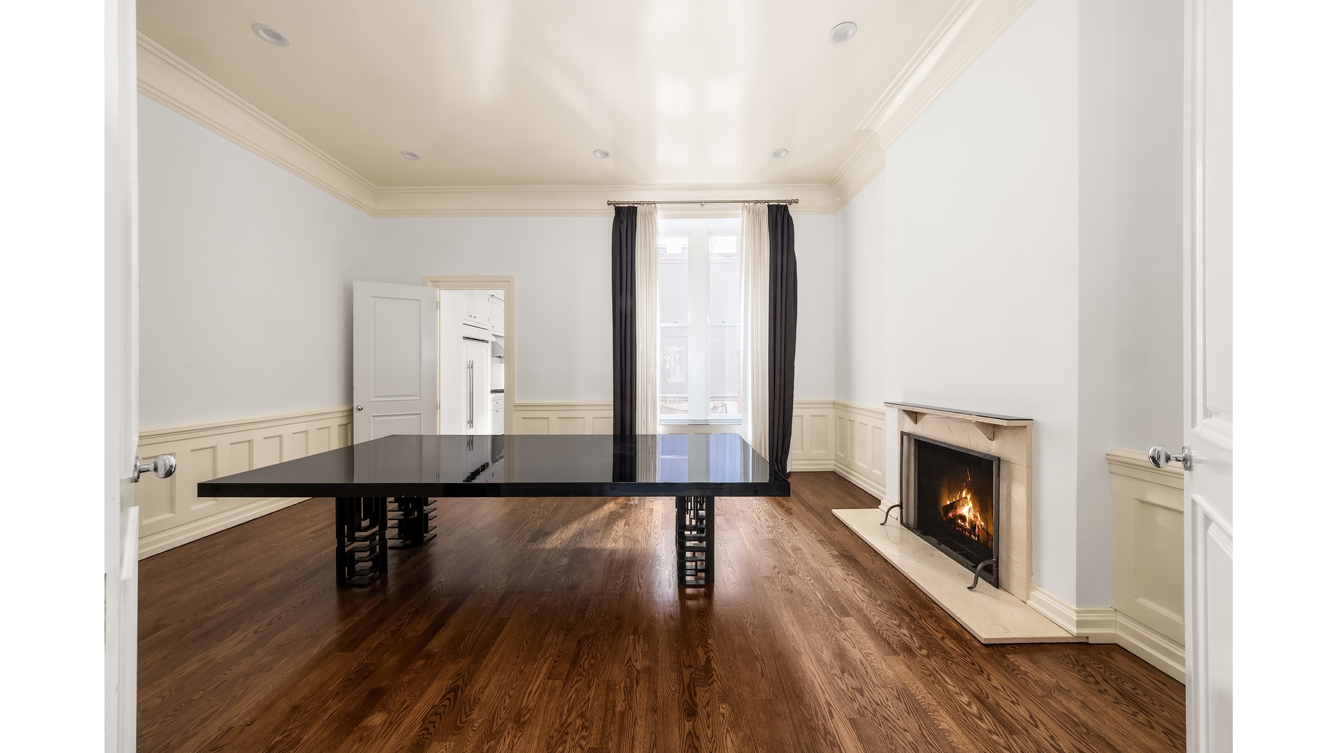 18 East 62nd Street Manhattan, NY 10065 - Photo 8 of 19 a living room with furniture wooden floor and a fireplace