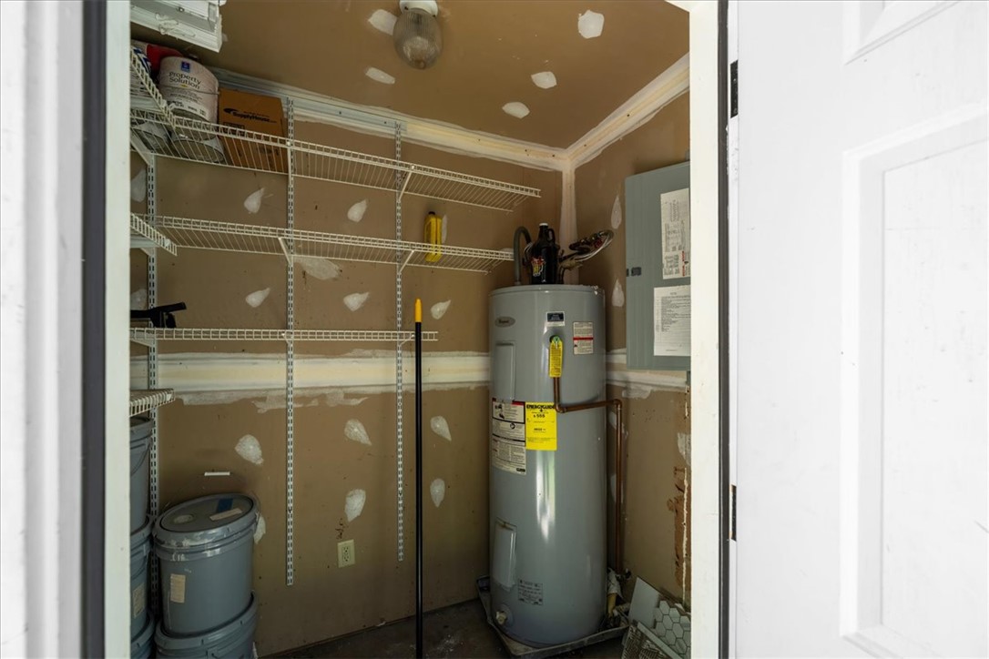 212 Blue Ridge Drive Clemson, SC 29631 - Photo 31 of 33 Essential utilities and wire shelving for storage define this functional space.
