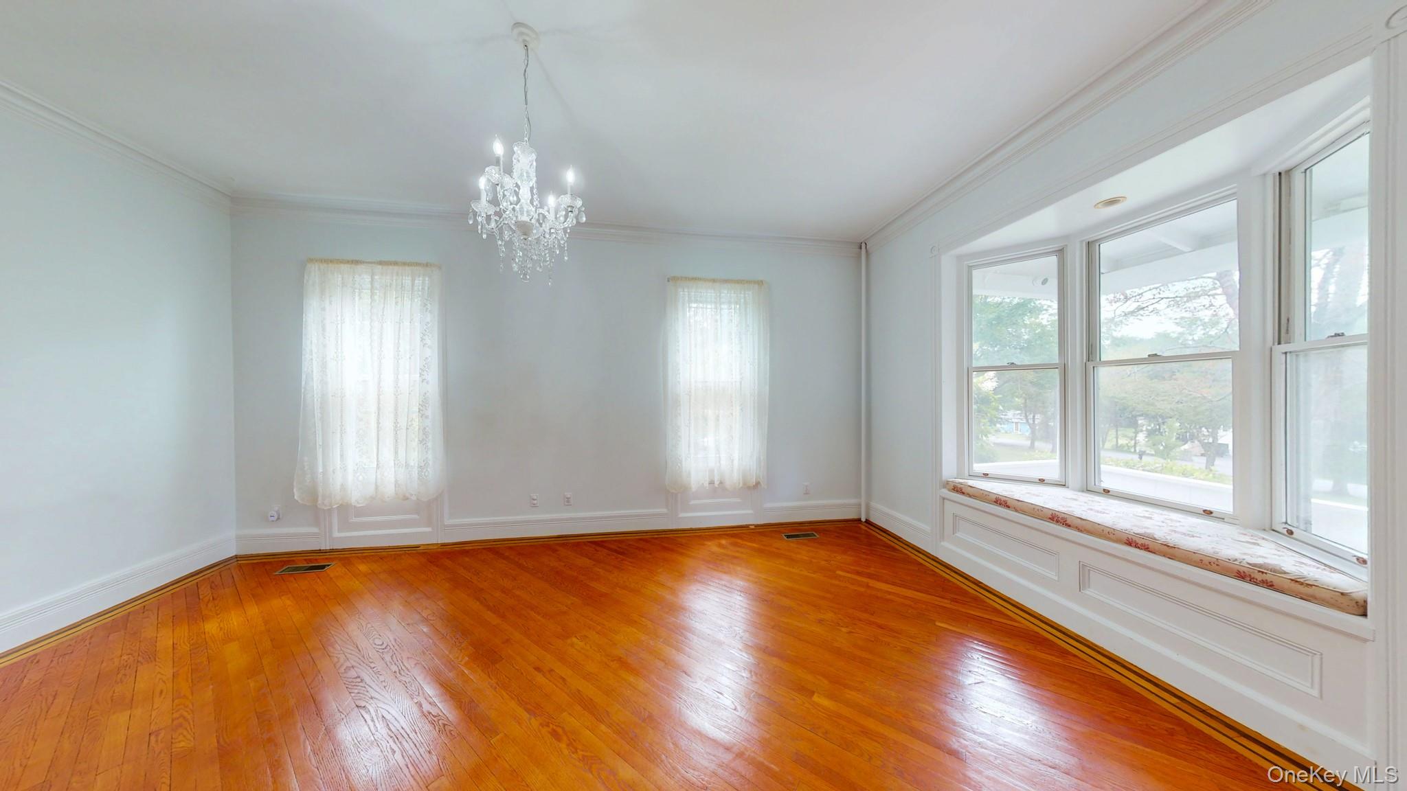 12 Perry Creek Road Washingtonville, NY 10992 - Photo 14 of 50 a view of empty room with wooden floor and fan