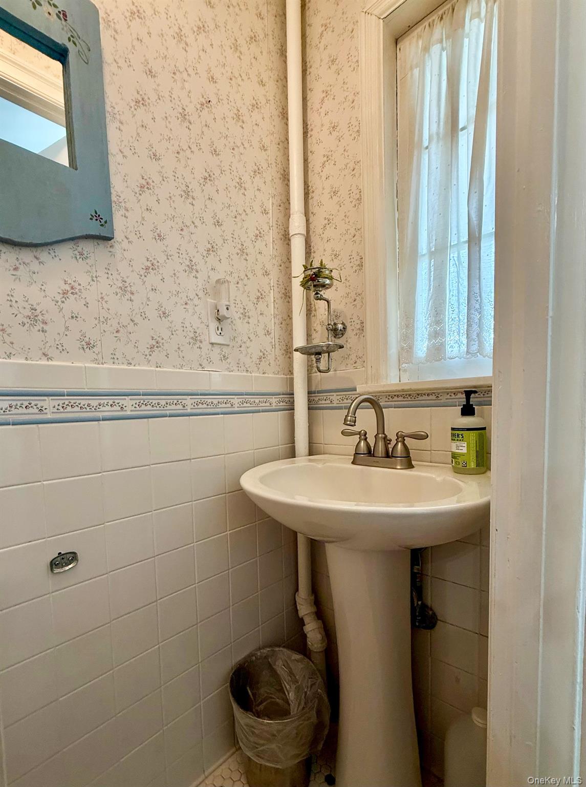 12 Perry Creek Road Washingtonville, NY 10992 - Photo 20 of 50 a bathroom with a sink a toilet and mirror