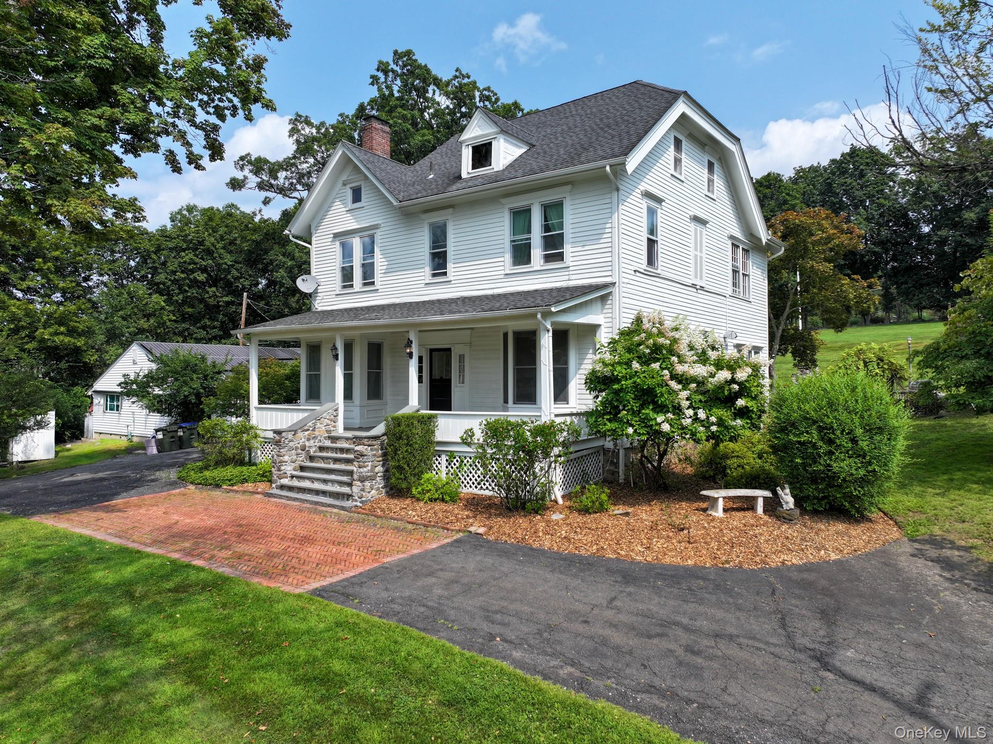 12 Perry Creek Road Washingtonville, NY 10992 - Photo 2 of 50 a front view of a house with yard and green space