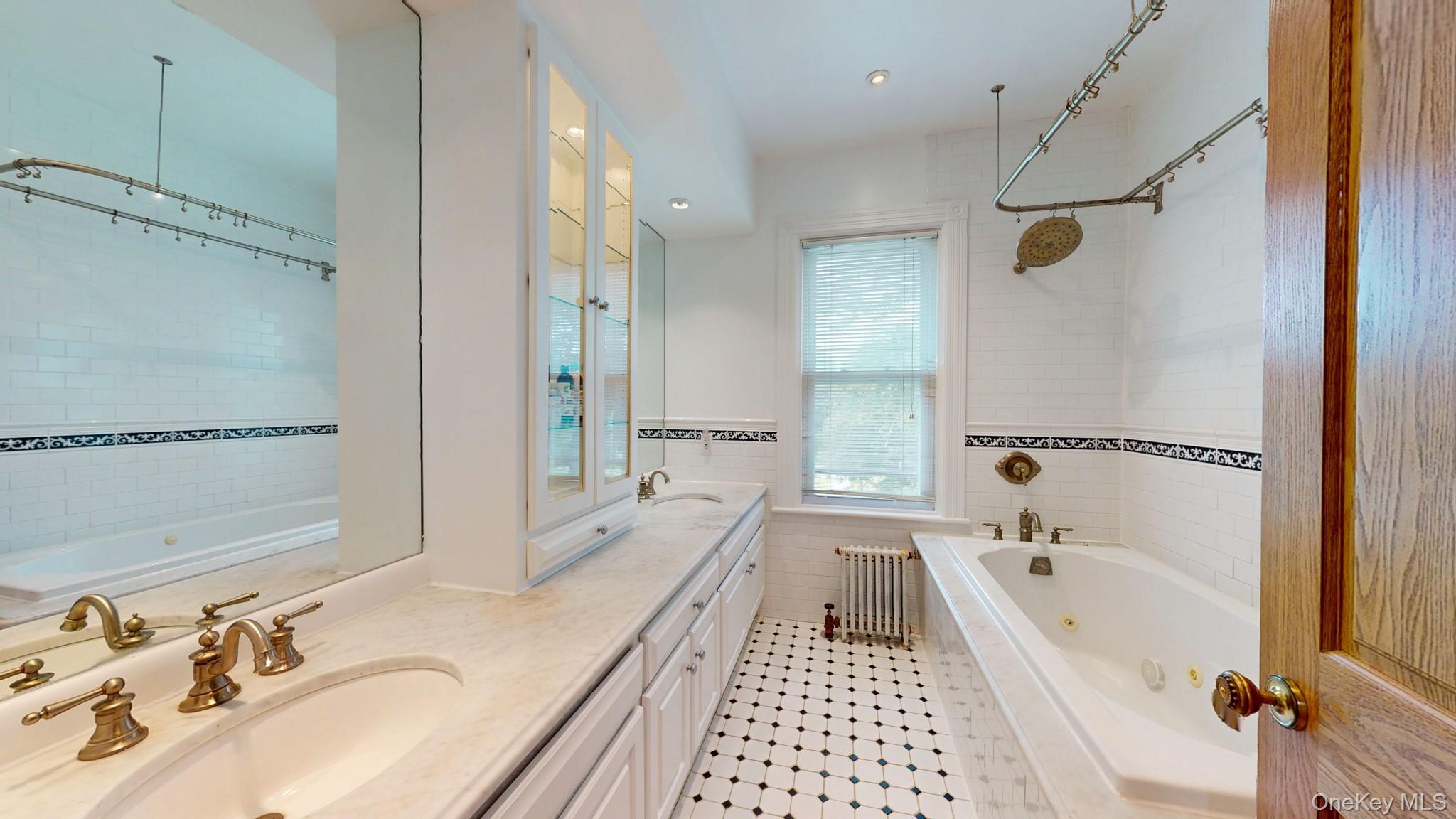 12 Perry Creek Road Washingtonville, NY 10992 - Photo 31 of 50 a bathroom with a bathtub and a shower