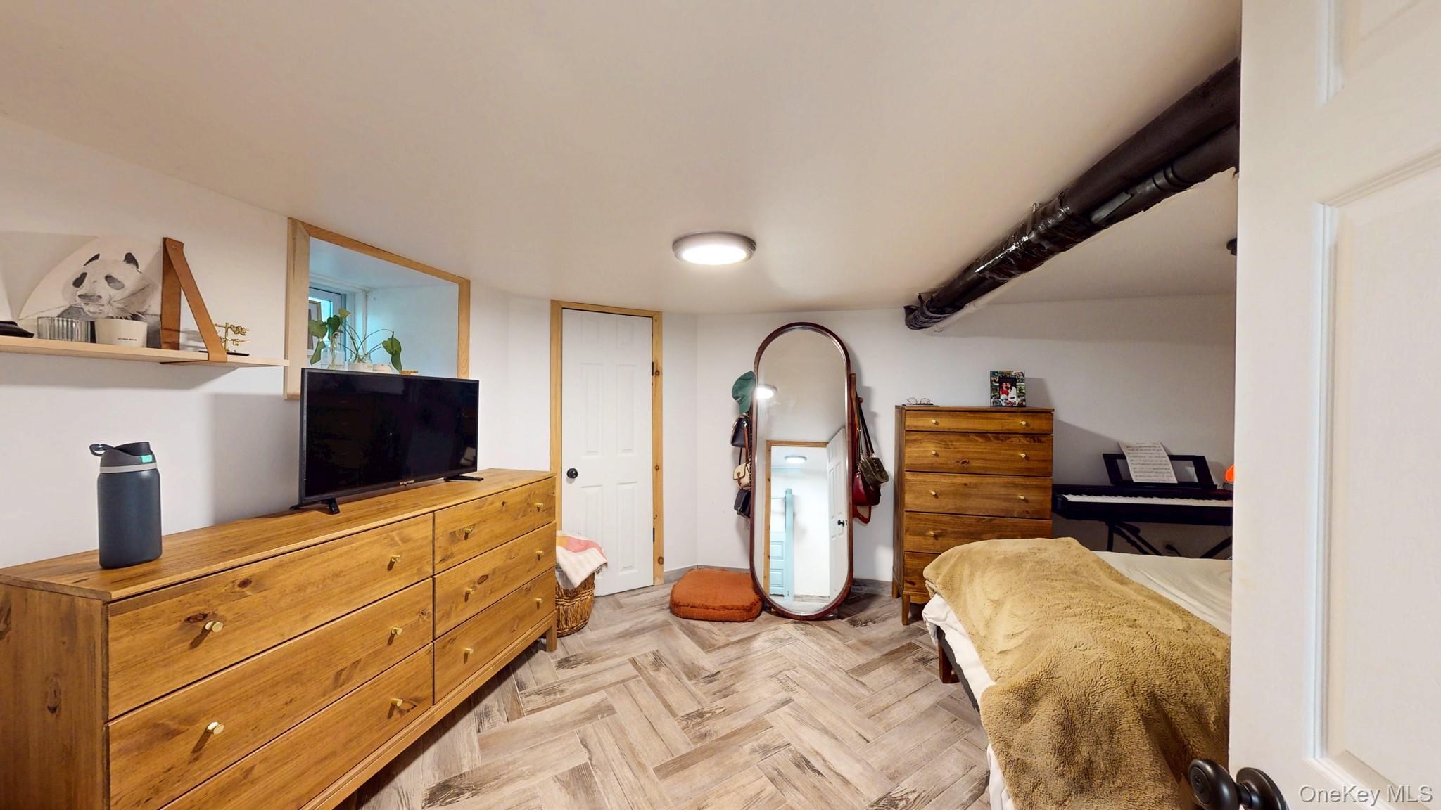 12 Perry Creek Road Washingtonville, NY 10992 - Photo 40 of 50 a living room with furniture and flat screen tv