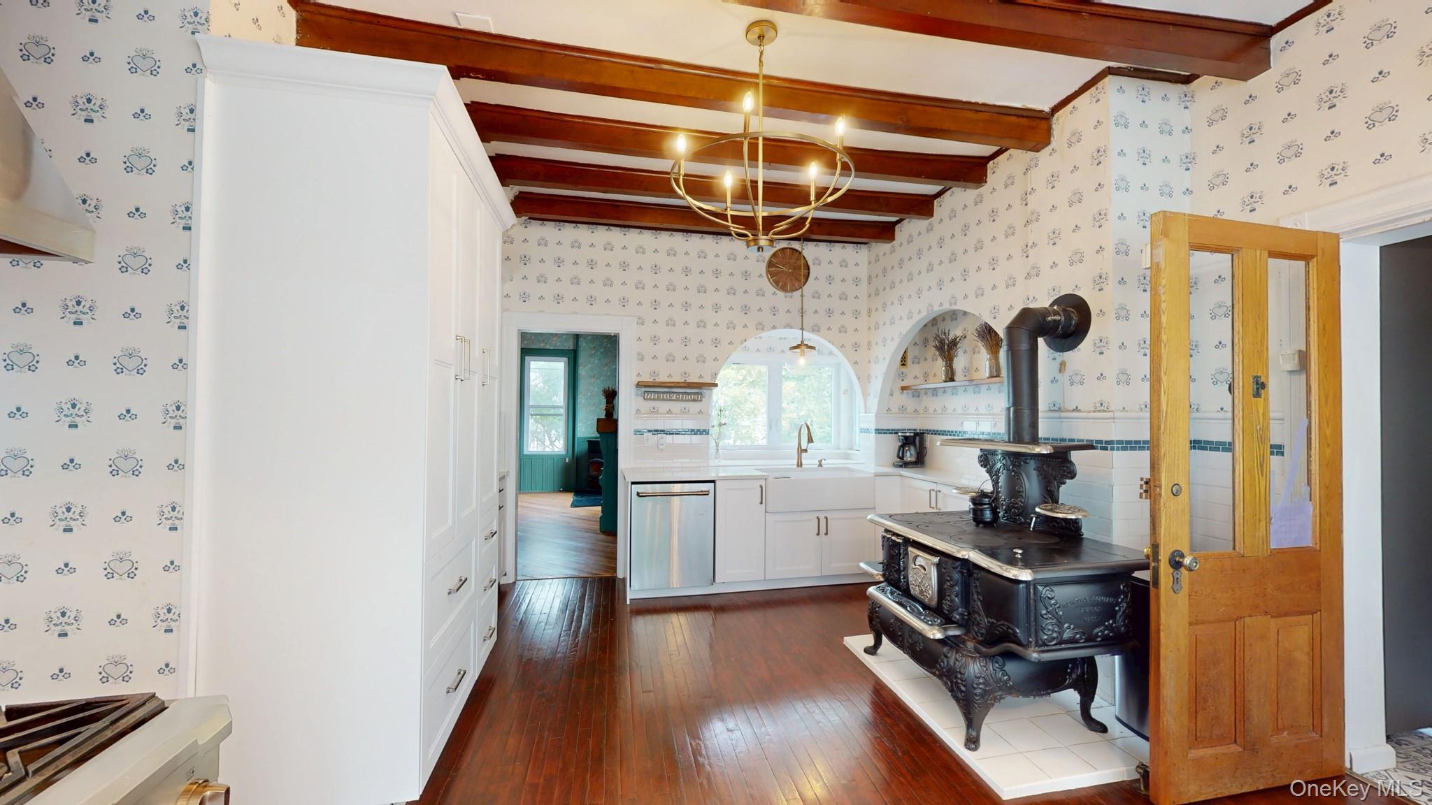 12 Perry Creek Road Washingtonville, NY 10992 - Photo 10 of 50 a kitchen with a refrigerator and a stove