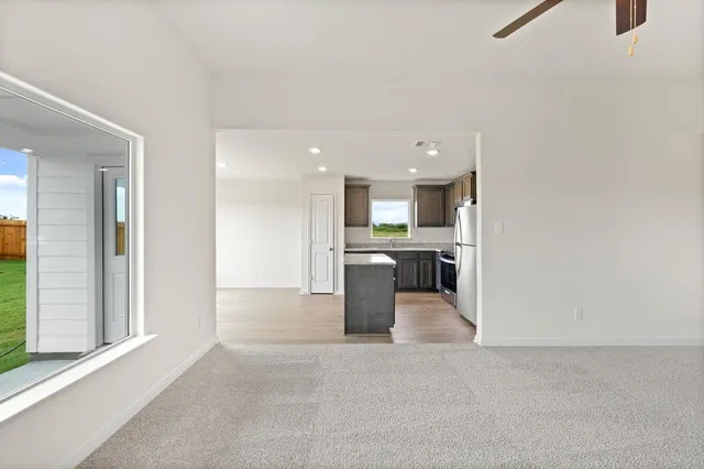 a view of a kitchen with a sink