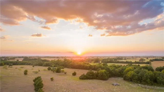 a view of a lake with a big yard