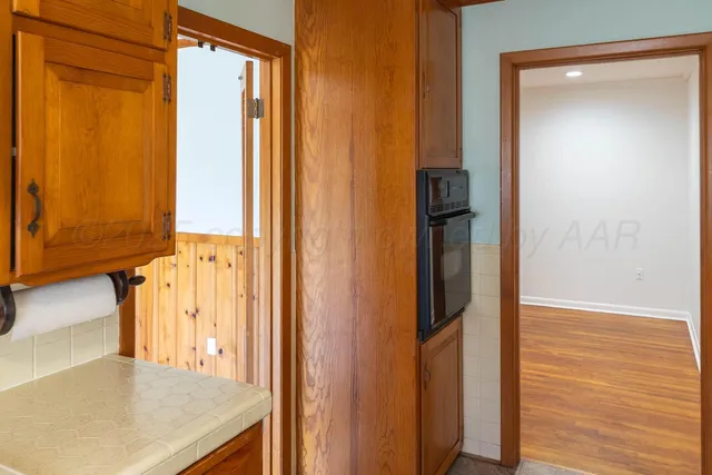 a view of a bathroom from a hallway