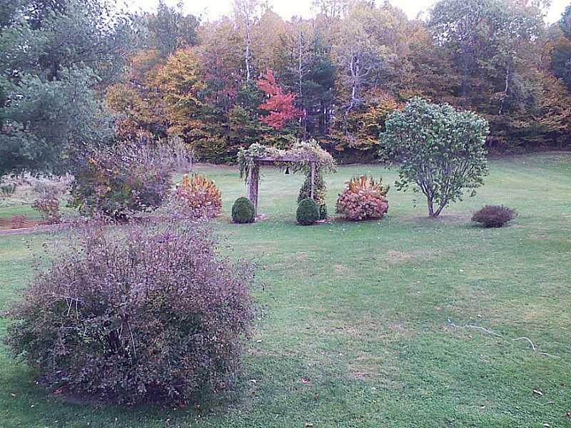 807 Gardiner Road Wales, ME 04280 - Photo 32 of 32 Yard/Garden. Colorful landscape.