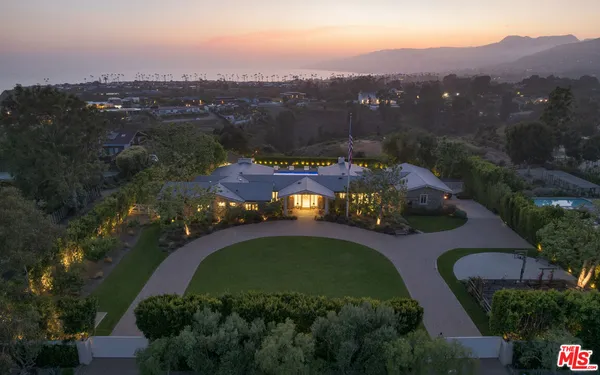 an aerial view of lake residential house and outdoor space