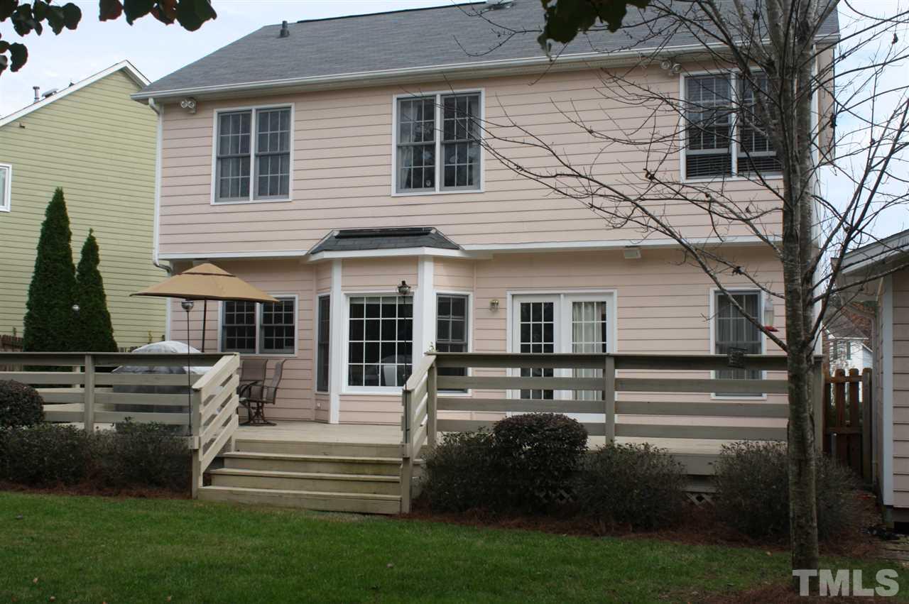 5415 Staysail Court Raleigh, NC 27613 - Photo 22 of 25 a front view of a house with a garden and plants